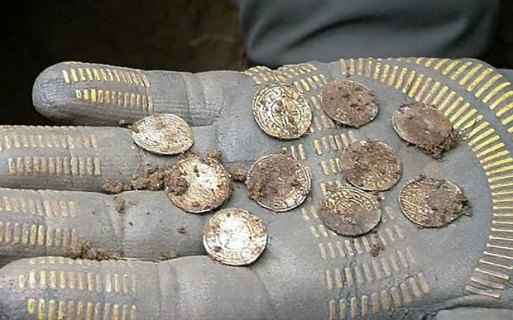 The 5,251 silver coins, which are more than 1,000 years old, were found in a farmer’s field near Aylesbury in Buckinghamshire. They are said to form one of the largest hoards of Anglo Saxon coins ever found in Britain and is thought to be worth more £1 million when auctioned.