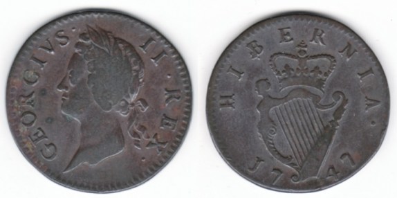 A 1747 George II, Type III copper Halfpenny of 9 Strings, S.6607, 8.52 g., coin orientation, plain edge.  Laureate bust left of the young George II left, legend around GEORGIVS .    II . R E X ., with the pellets at mixed heights.  Top ribbon to just rt. of middle of  X;  ribbon well clear of X.  Rev. crowned harp of 9 strings divides date at bottom 17  47, with H I B E R N I A . around at top.   Top of crown to midpoint between E and R.