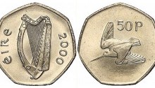 The coin used the woodcock design from the pre-decimal farthing coin, designed by Percy Metcalfe and first introduced by the Irish Free State in 1928.