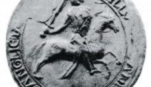 Between March 1185 and as late as October 1199, John, the youngest son of Henry II used an equestrian seal (fig. 1) of about three inches in diameter on which he is represented as a fully armed knight, galloping to the right, and carrying a convex shield charged with two lions passant. He wears a hauberk of mail under a cloth surcoat, and a coif surmounted by a round-topped nasal helmet which interrupts the legend between the words, HIB'NIE and + SIGILLVM. In his right hand he brandishes a sword. The horse wears an ornamental breast-band, saddle and stirrups; it is not caparisoned. The legend reads, + SIGILLVM IOHANNIS FILII REGIS ANGLIE DOMINIE HIB'NIE