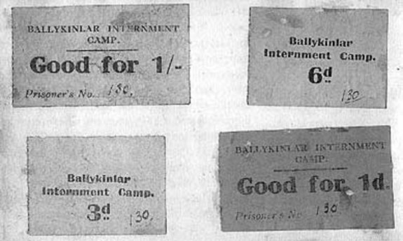 Ballykinlar saved & displayed in an autograph book - they refer to Prisoner No. 130.