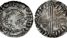 Hiberno-Norse. Circa 1055/60-1065. AR Penny (17mm, 1.06 g, 3h). Phase IV (’scratched die’) coinage, Long Cross type. Uncertain mint signature and moneyer. + IIII+IRIIONIIIOIIIO, draped bust left; numerous pellets around / IMI IIIL IIIIR IIIM, voided long cross, with triple crescent ends; two pellets in first quarter, ‘hand’ symbol in second, trefoil of pellets in third, X and two pellets in fourth. O`S 22; SCBI 32 (Ulster), 310-5; D&F 25; SCBC 6134. VF, toned