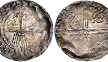 Hiberno-Norse. temp. Murchad mac Diarmata. 1052-1070. AR Penny (18mm, 0.50 g, 9h). Phase IV coinage, Facing bust/Long Cross type. Uncertain mint signature and moneyer. Struck circa 1055/60-1065/70. IIIIIIIIIII•III[...] II•I[...]IIII, schematized facing bearded head: pellet-in-annulet eyes, annulet cheeks, curvilinear mouth and mustache with one pellet at end, and linear beard; annulet above / IIIIII III, voided long cross, with triple crescent ends; in first and fourth angles, retrograde S with triple pellets at each end, “hand” symbol in second, and annulet-with-tail symbol in third. Blackburn 4, –; O’S 46 var. (symbol in third quarter); SCBI 8 (BM), –; cf. SCBI 32 (Belfast), 309; SCBI 22 (Copenhagen), 235; D&F 27; SCBC 6176. VF, toned, area of weak strike. Very rare.
