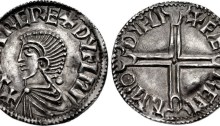 Hiberno-Norse. Sihtric III Olafsson. Circa 995-1036. AR Penny (20mm, 1.47 g, 4h). Phase I coinage, Long Cross type. Difelin (Dublin) mint; Færeman, moneyer. Struck circa 1000-1010. Draped bust left; pellet to right / + FÆ REM N M(dart)Θ DYFLI, voided long cross, with pellet at center and triple-crescent ends; pellet in each central crescent. Cf. O'S 6; SCBI 8 (BM), 21 var. (rev. legend); SCBI 32 (Ulster), 19-20; SCBC 6103. EF, lightly toned, slight bow to flan