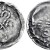 IRELAND, Hiberno-Norse. temp. Murchad mac Diarmata – Gofraid mac meic Arailt. Mid-late 11th century. AR Penny (18mm, 0.78 g). Phase V coinage. Uncertain mint signature and moneyer. Struck circa 1065-1085/95. Four croziers forming cross in saltire, with annulet at center; retrograde S to left, scourge to right; blundered and illegible legend around / Voided long cross, with triple crescent ends and pellet at center; pellet, annulet, pellet, and ‘hand’ in angles; blundered and illegible legend around. SCBI 22 (Copenhagen), 269 (same dies); SCBI 32 (Belfast), 350-1 (same dies); SCBC 6182. VF, toned. Struck on a broad flan. Very rare.