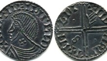 Hiberno-Norse silver penny, Phase III, Class E – Bust with Symbol(s), Type 1b - Quatrefoil on Neck, Long Cross with one hand, two pellets and S. The Old Currency Exchange, Dublin, Ireland.