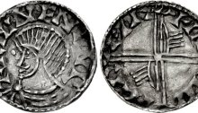 An Hiberno-Norse silver penny, Phase III, Class E (Bust with Symbols), Type 1a (Pellet before Face), with 2 stylised hands on reverse. The Old Currency Exchange, Dublin, Ireland.